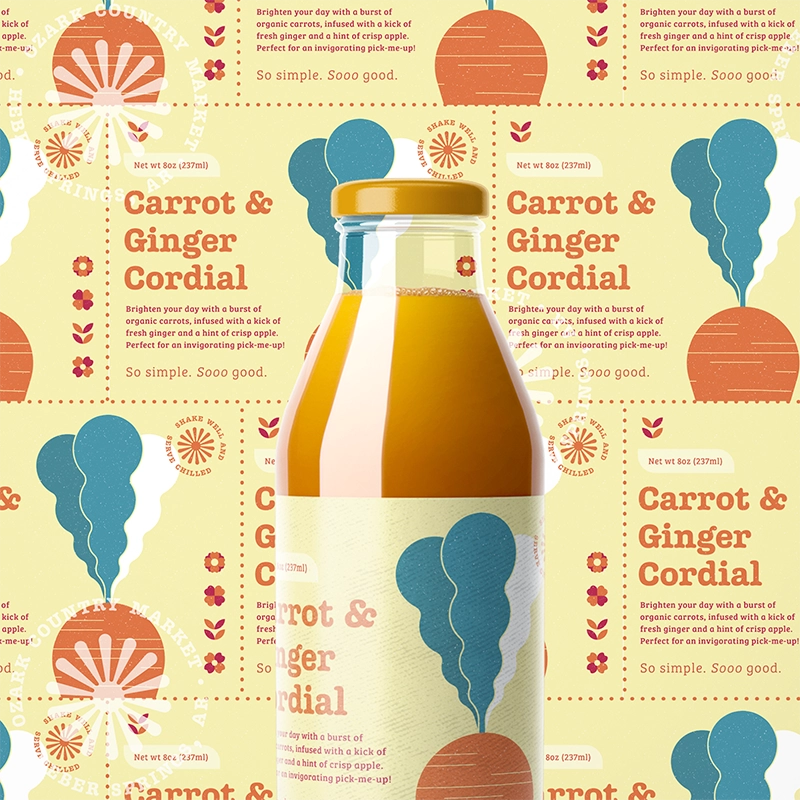 A colorful yellow and orange label design for a bottle of carrot and ginger cordial for the Ozark Country Market